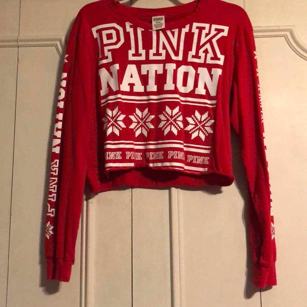 Pink crop top and matching leggings.